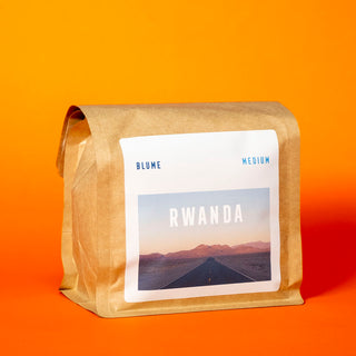 Bag of Rwandan coffee on orange background