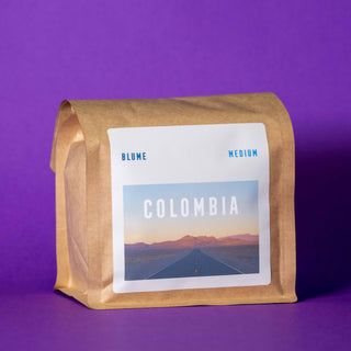 Colombia Coffee on purple background