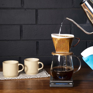 Pour-over filter coffee with mugs
