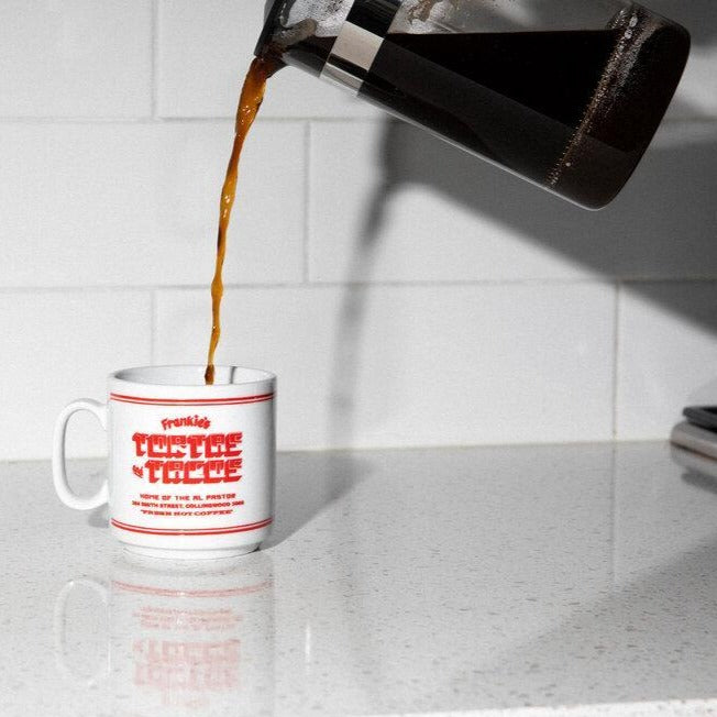 Pouring coffee into mug